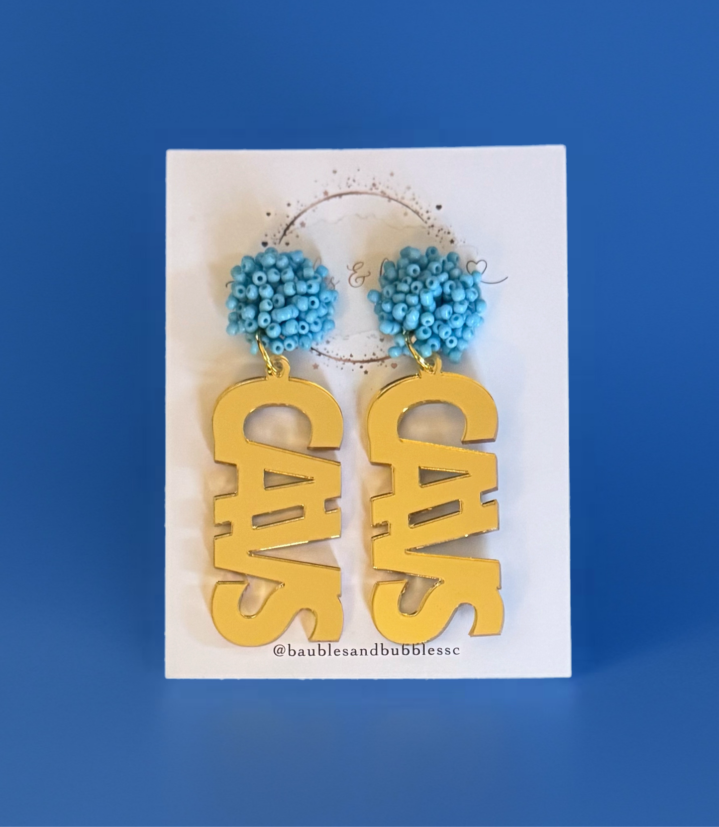 Gold CAVS with light blue topper